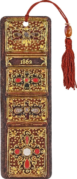 Decorative tasseled bookmark with intricate gold and red designs, featuring the year 1862, on a brown background.