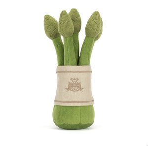 Back view of a Jellycat asparagus plush toy on a white background