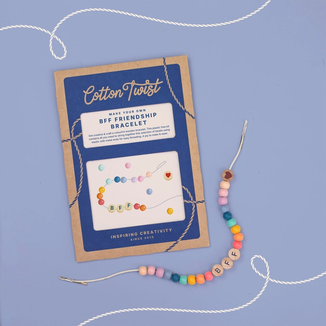 Cotton Twist BFF friendship bracelet kit with colorful beads on a blue background.