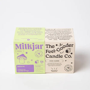 Box packaging for a candle with Green and Purple Milkjar branding. 