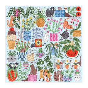 Jigsaw puzzle box with a colourful cats and plants design on a white background.