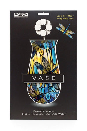 Packaged vase with a yellow and blue dragonfly design on a black background, featuring the brand 'MODGY'.