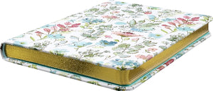 Floral-patterned hardback notebook cover with a gold gilded page edges on a white background