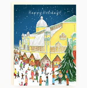 A blank art greeting card featuring an illustration of Lansdowne Park in Ottawa with a Christmas theme, including people, trees, and a building with a snow-covered roof.