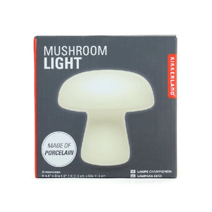grey package box on white background. pictured on box is an off-white light in a mushroom shape. main texts read "mushroom light" and "made of porcelain". kikkerland product