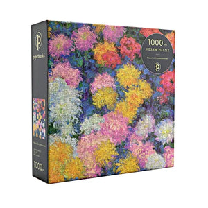 Puzzle box with colorful floral design and 'paperbanks' branding on a white background. 
