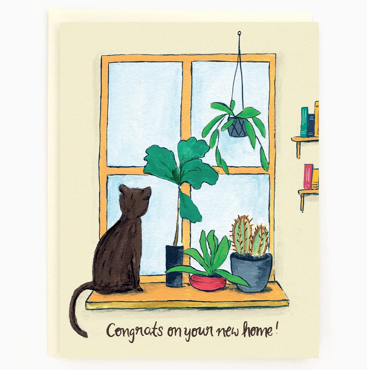 Greeting card featuring a cat and plants on a windowsill, with the text 'Congrats on your new home!' on a yellow background.