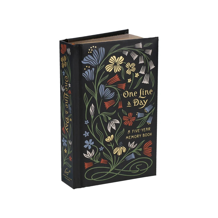 Decorative book titled 'One Line a Day' with floral designs on a white background.