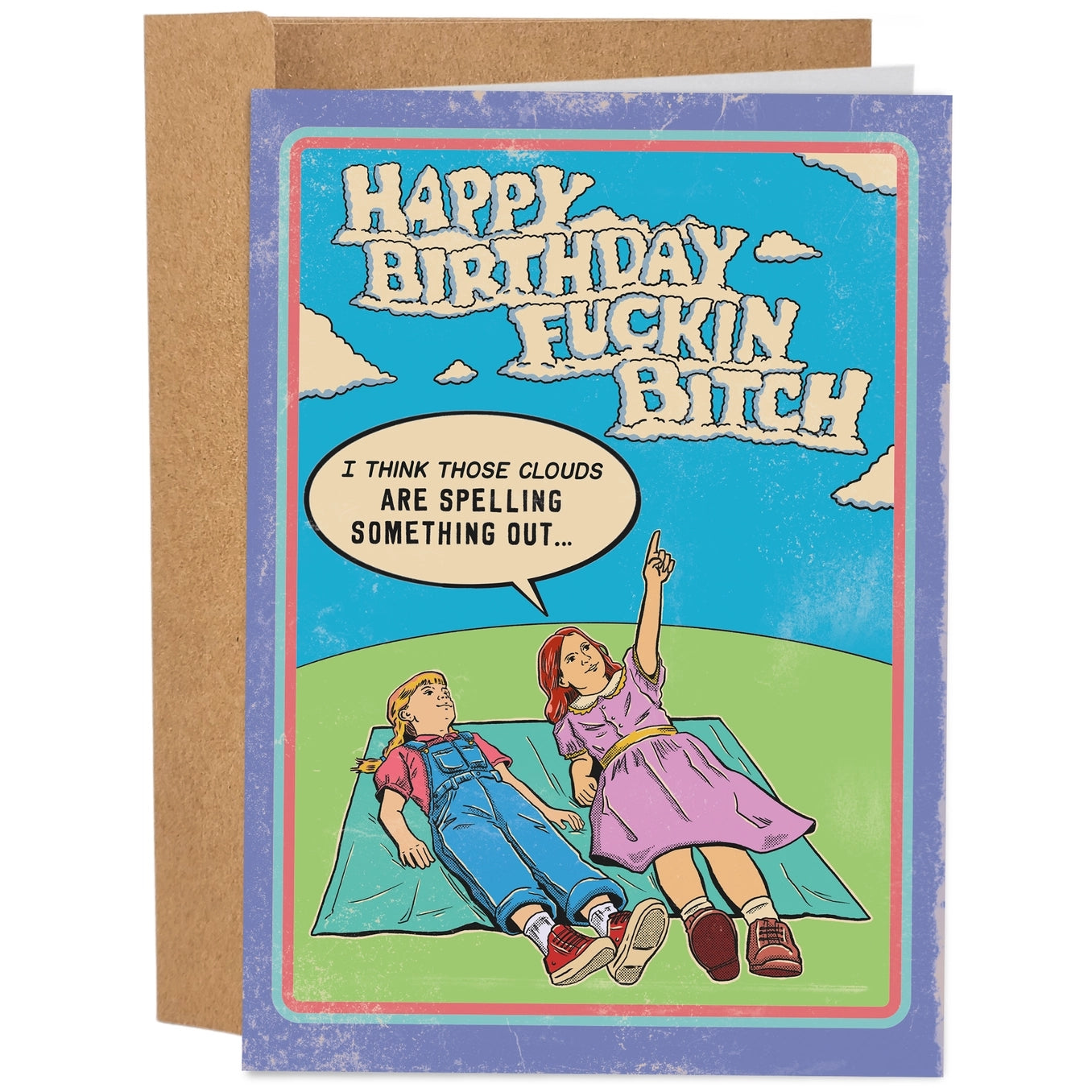 Greeting card featuring an illustration of two girls lying on a blanket on grass, one of which is pointing a finger at clouds in the sky. The text 'I think those clouds are spelling something out...' is shown in a speech bubble, while the clouds spell out the text 'Happy Birthday Fuckin Bitch' on a blue background. 