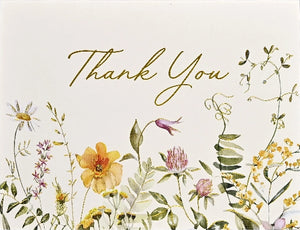Card with floral design with 'Thank You' text on a light background