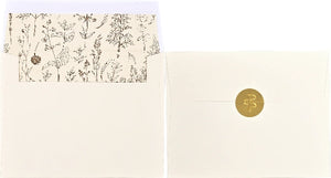 Two envelopes with floral design on one and a gold seal on the other, on a white background.