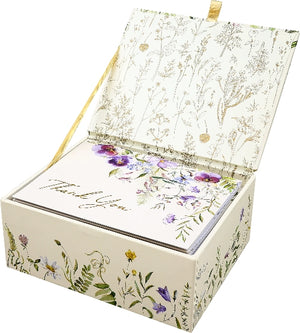 Card box with floral design and 'Thank You' cards inside on a white background
