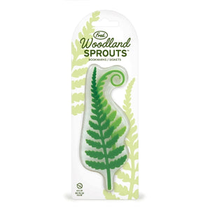 Packaged bookmark designed to look like a green fern sprouting from the top of the package, labeled 'Woodland Sprouts' by Fred & Friends.
