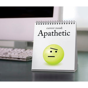 Desk flipbook open on a page with an abstract face and text saying 'current mood: apathetic' on a desk surface.