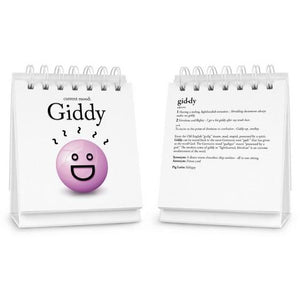 Desk flipbook open on a page with an abstract face and text saying 'current mood: giddy' on a white background. 
