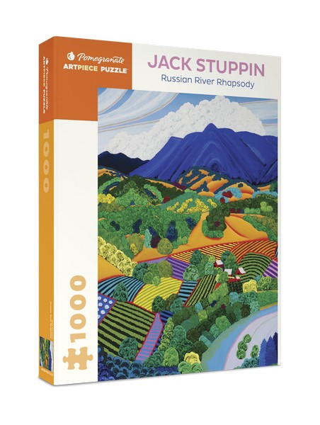 white puzzle box with orange accents. the centre of the box has an image of a countryside landscape