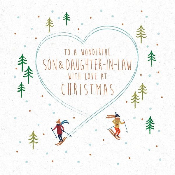 white christmas card. two drawn skiiers form a blue heart with their tracks. "to a wonderful son & daughter-in-law with love at christmas" is written in a thin font at the centre of the heart.